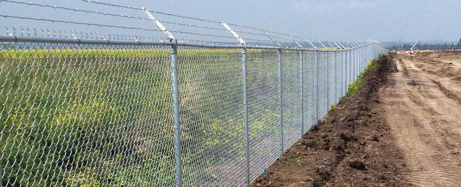 Chainlink Fence with Barb Wire